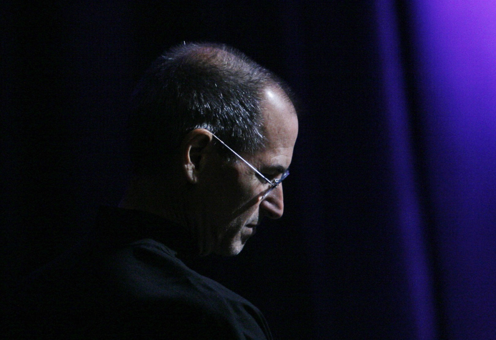 Steve Jobs looking down serious